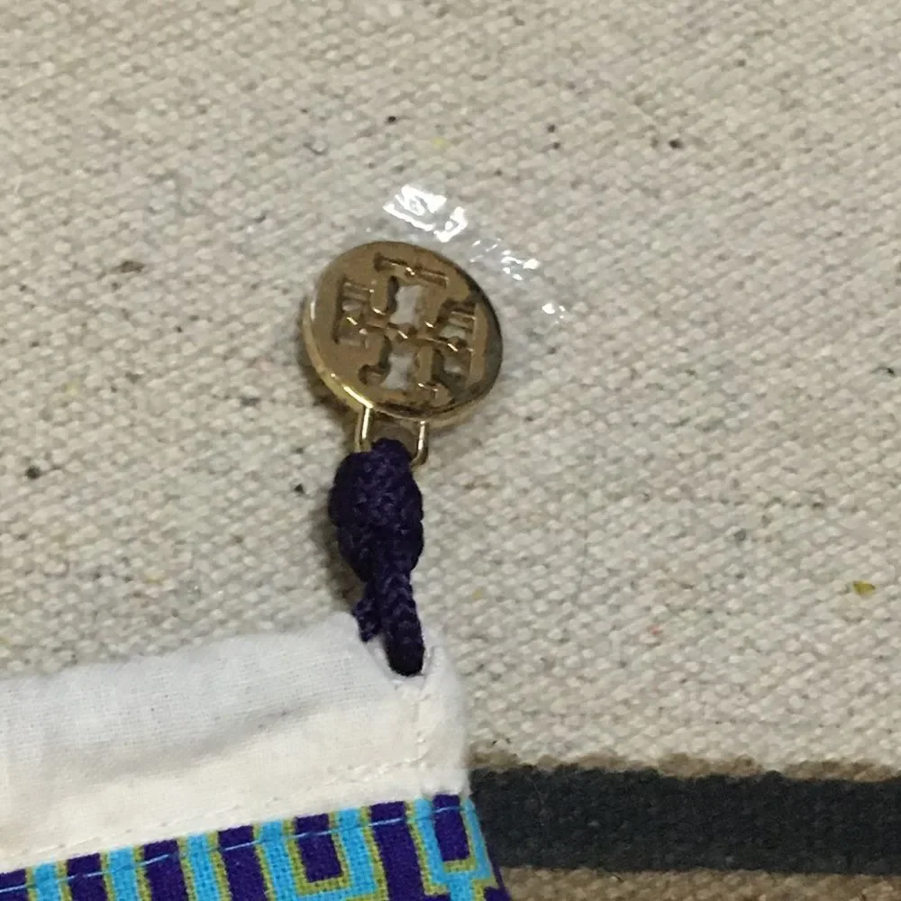 Tory Burch Large Blue trim gold logo drawstring charm